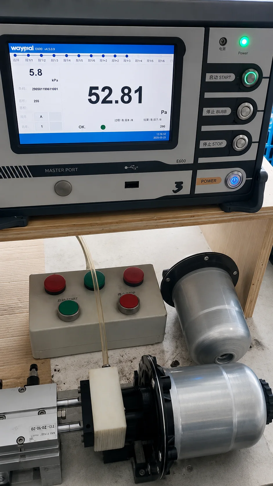 Fuel filter testing equipment showing pressure measurement during inspection